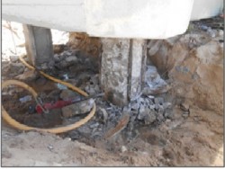 Expose pile at pile repair area using hacking breaker